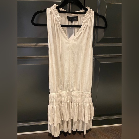Avery Rayne creme sleeveless split neck ruffle dress - Picture 1 of 3